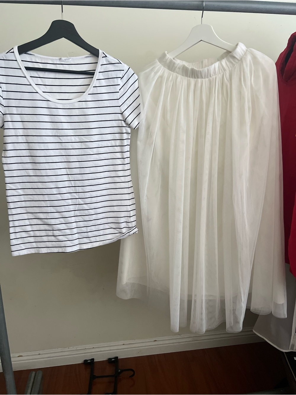 white tulle skirt features a layered, flowy design and an elastic waistband for